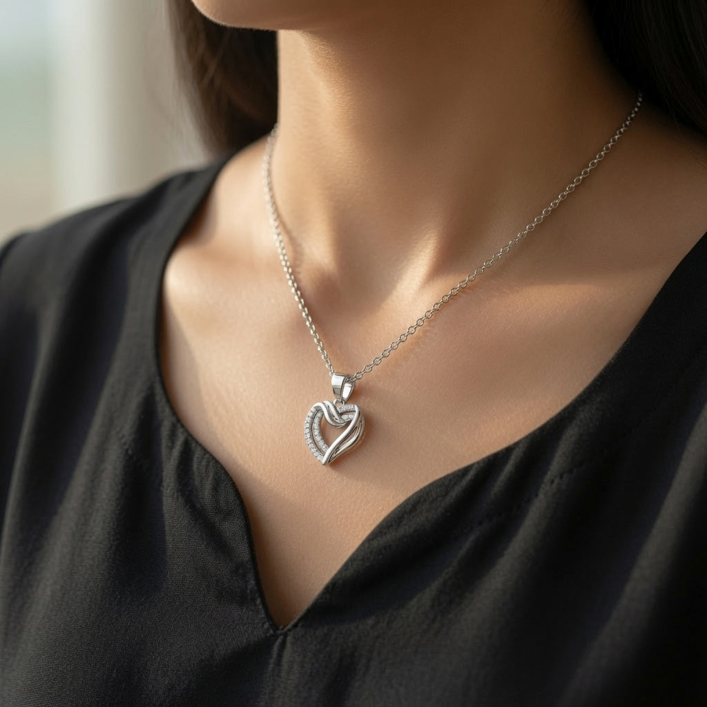 Amor Heart Pendant – silver – worn on neck | 925 Sterling Silver Jewelry by Cilhouette