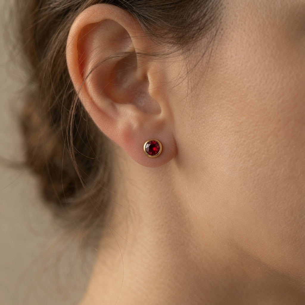 Bezel Solitaire Studs – red stone – close-up detail | 925 Sterling Silver Jewelry by Cilhouette